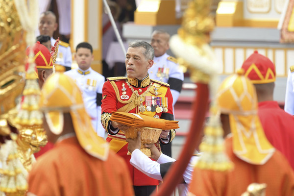 Thailand's King Maha Vajiralongkorn takes part in the funeral of late Thai King Bhumibol Adulyadej in Bangkok, Thailand, Thursday, Oct. 26, 2017. A ceremony in an ornate throne hall Thursday morning began the transfer of the remains of Thailand's King Bhumibol Adulyadej to his spectacular golden crematorium in the royal quarter of Bangkok after a year of mourning for the monarch Thais hailed as "Father." (AP Photo/Kittinun Rodsupan)