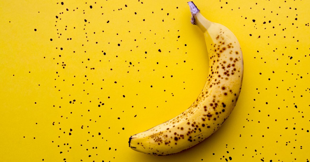 Ripe banana with brown spots