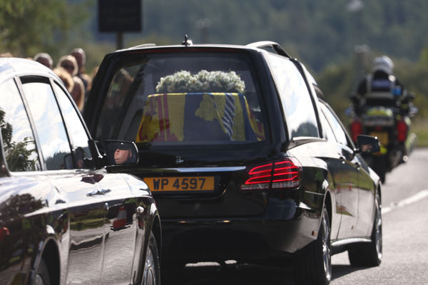 The hearse carrying the coffin of Britain's Queen Elizabeth departs Balmoral Castle, in Balmoral, Scotland, Britain September 11, 2022. REUTERS/Russell Cheyne