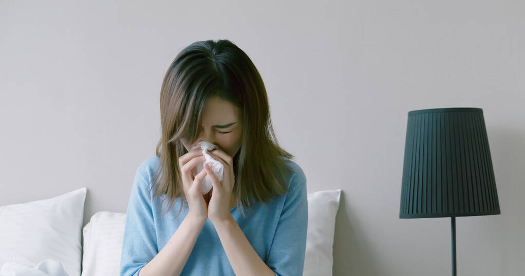 woman has running nose