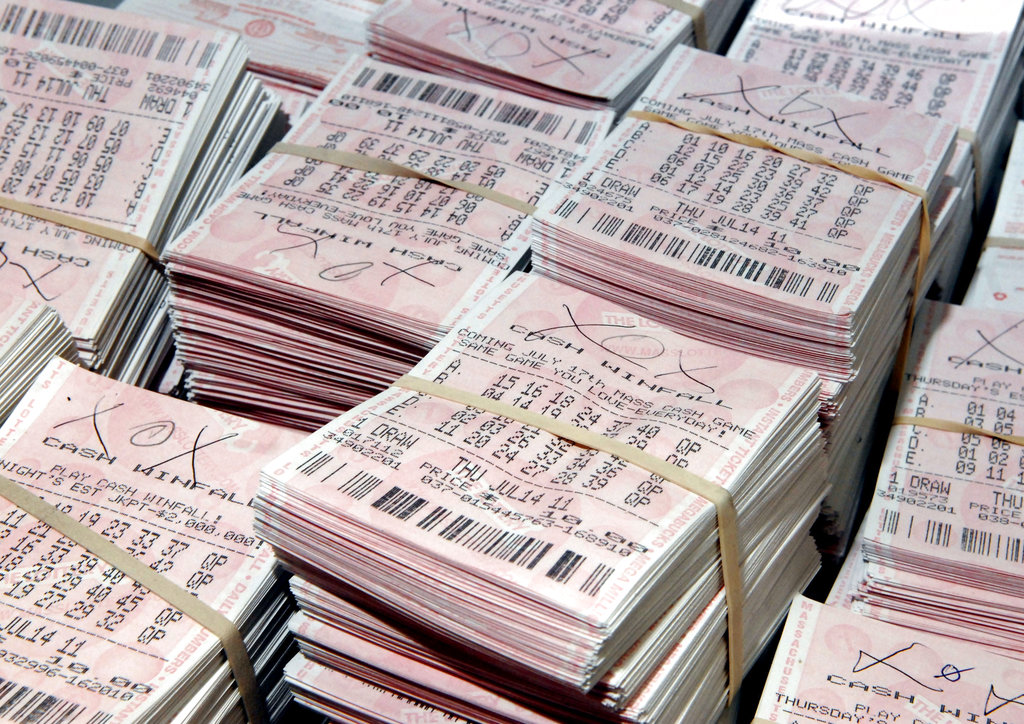 Gerald Selbee of Evart, Michigan shows some of the 1.22 million Massachusetts lottery tickets he stores in a barn on his mid-Michigan property Friday, Oct. 14, 2001. A member if the GS Investment Strategies, LLC club, Selbee has made numerous trips to western Massachusetts to purchase the tickets, spending between $600.000 - $720,000 of the club's money per trip. (AP Photo/John L. Russell)