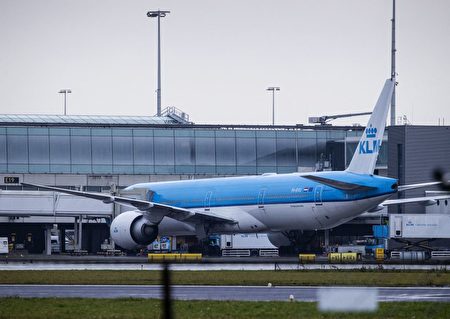 A Klm airplane landed from Johannesbourg is parked at the gate E19 at the Schiphol Airport, The Netherlands, on Mnovember 27, 2021. - Dutch health authorities said that 61 passengers aboard two KLM flights from South Africa tested positive for Covid-19 and the results were being examined for the new Omicron variant. The positive cases -- more than one tenth of the 600 people on the two planes -- were quarantined in a hotel near Amsterdam's Schiphol Airport, one of Europe's biggest international air travel hubs. - Netherlands OUT (Photo by Sem van der Wal / ANP / AFP) / Netherlands OUT (Photo by SEM VAN DER WAL/ANP/AFP via Getty Images)