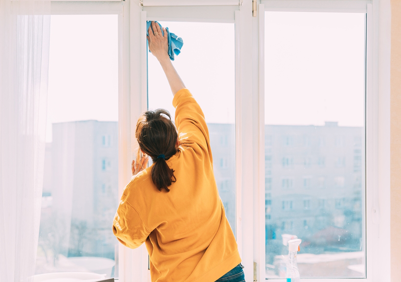 Woman,Of,Fifty,In,Yellow,Sweater,And,Jeans,Washes,Dusty