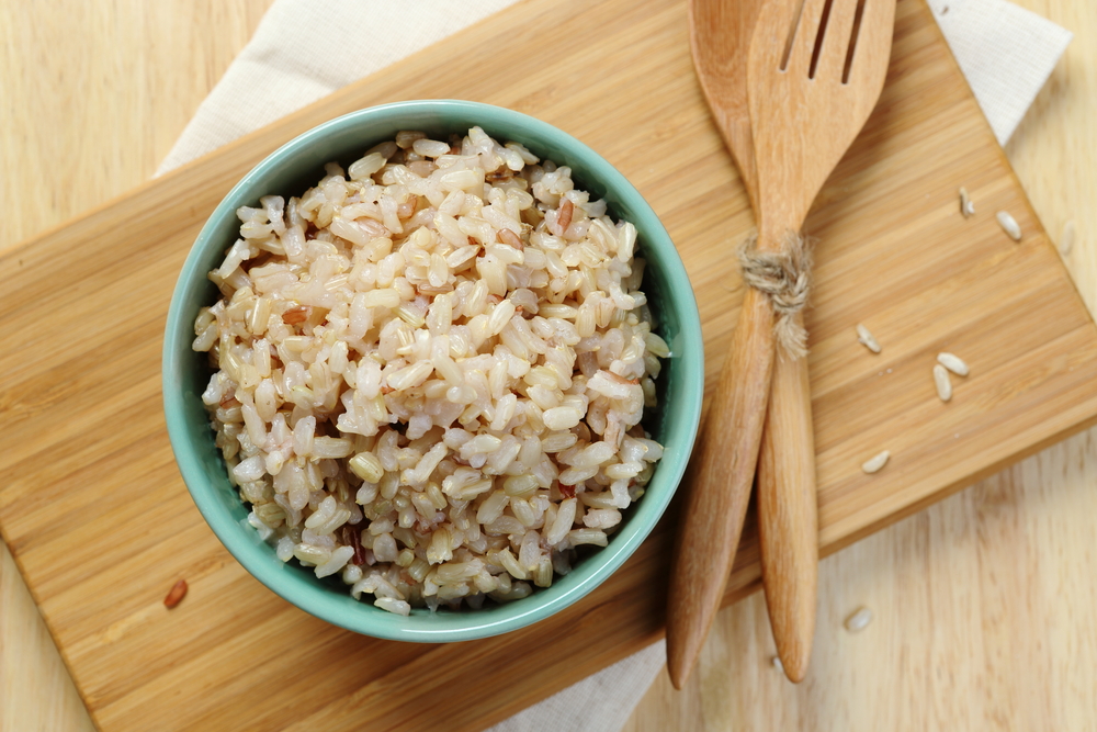 Organic,Brown,Rice,In,The,Bowl,On,The,Wooden,Table